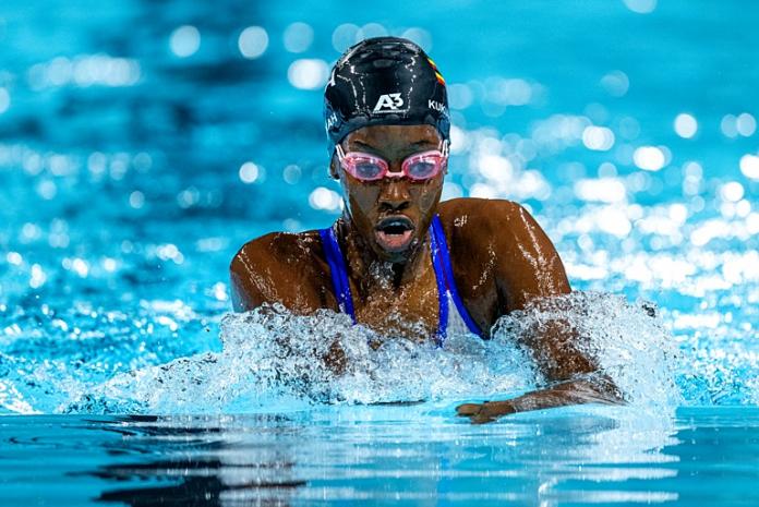 Husnah Kukudakwe, a female athlete from Uganda, is swimming