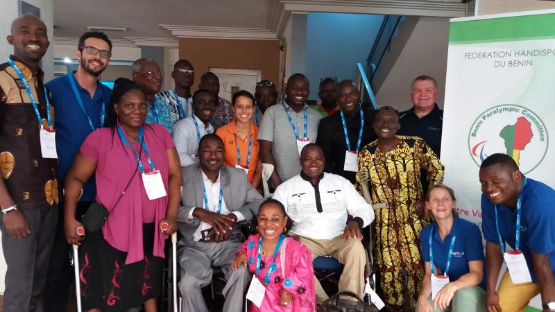 a group of officials smile for the camera