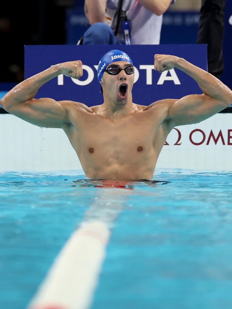 Para swimmer Simone Barlaam roars in celebration in the pool