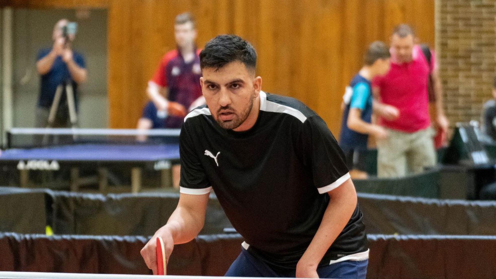 Sayed Amir Hossein Pour, a member of the Refugee Paralympic Team, competes in Para table tennis