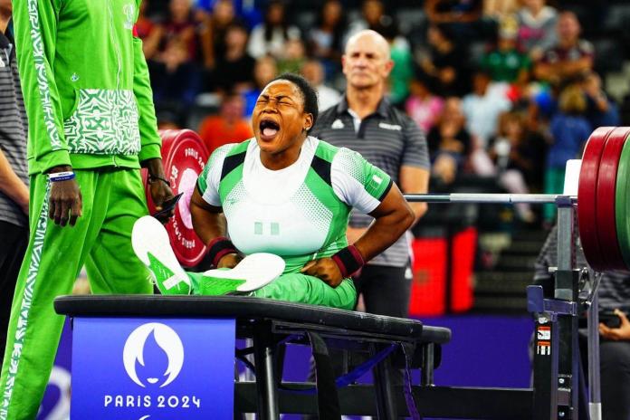 An athlete celebrate her win