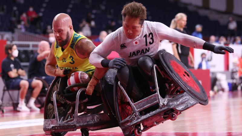 Two wheelchair rugby players clash Shinichi Shimakawa