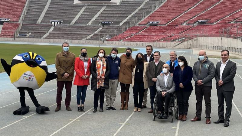 Santiago 2023 representatives pose for a group photo after announcing the Games venues.
